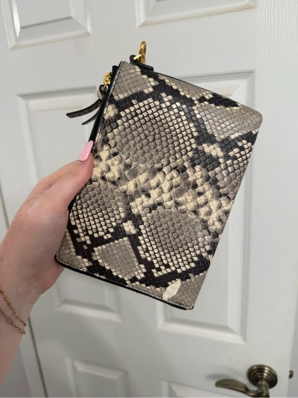 Tory Burch Snake-Print Wristlet in Black and Cream with Gold Logo